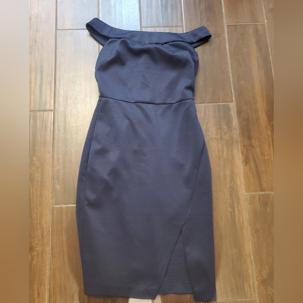 Pencil navy blue pattern dress size 4 business casual very elegant.  Wedding par